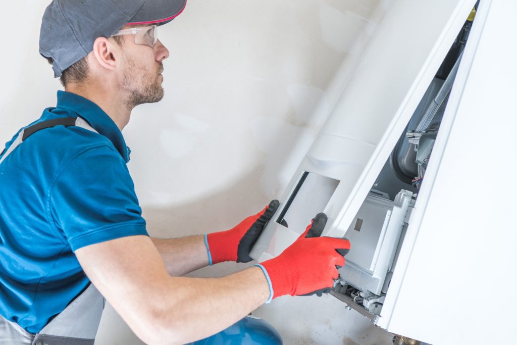 Tech Checking Furnace
