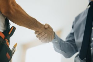 homeowner-and-contractor-shaking-hands
